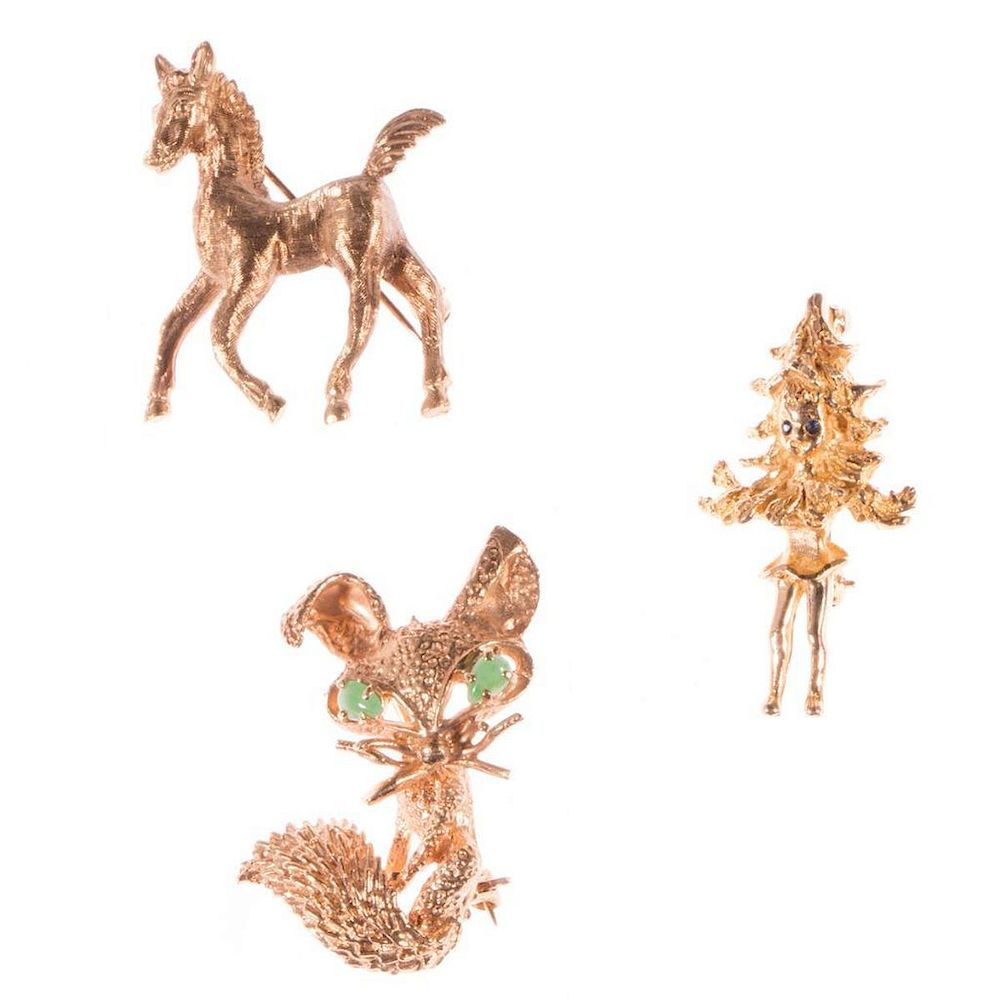 Appraisal: Three k gold animal brooches gross weight approximately grams horse