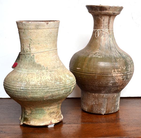 Appraisal: TWO CHINESE HAN DYNASTY GLAZED EARTHENWARE JARS the largest cm