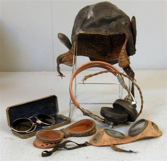 Appraisal: World War II black leather flying cap two pairs of