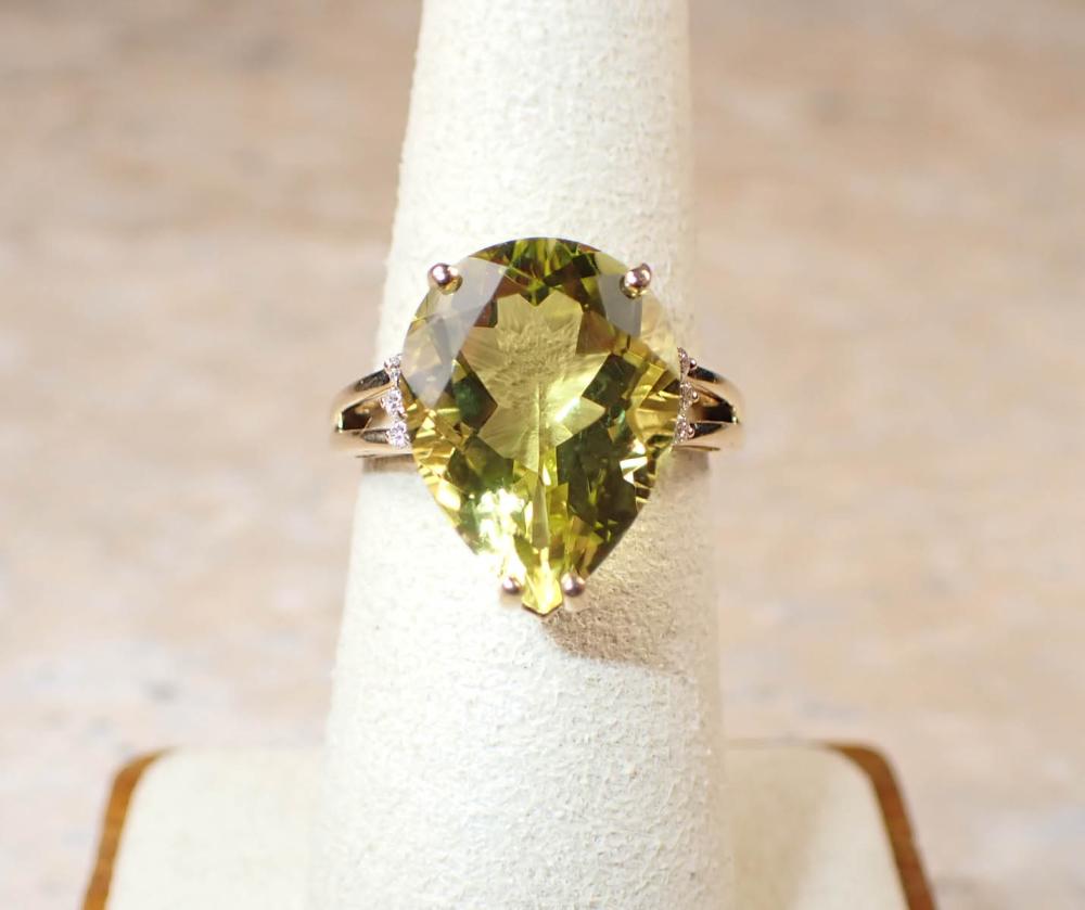 Appraisal: LEMON QUARTZ DIAMOND AND FOURTEEN KARAT GOLD RING The k