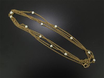 Appraisal: A gold long guard chain The fine link neck chain