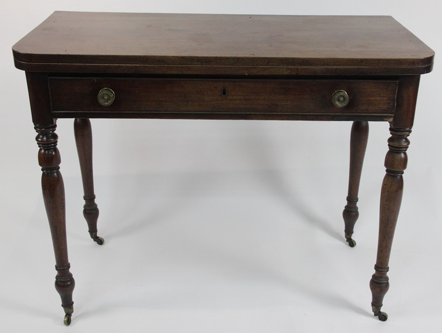 Appraisal: A th Century mahogany fold-over card table fitted a single