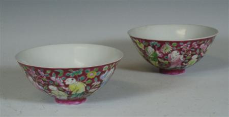 Appraisal: A pair of Chinese polychrome painted bowls each decorated to