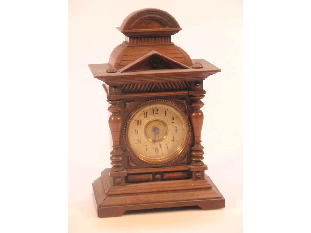 Appraisal: A Black Forest walnut cased bracket clock of small dimensions