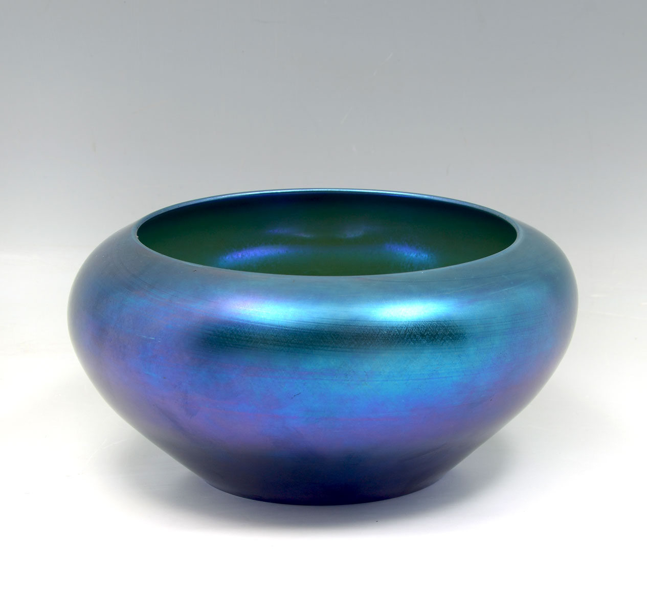 Appraisal: LARGE STEUBEN BLUE AURENE BOWL Iridescent blue into purple bowl