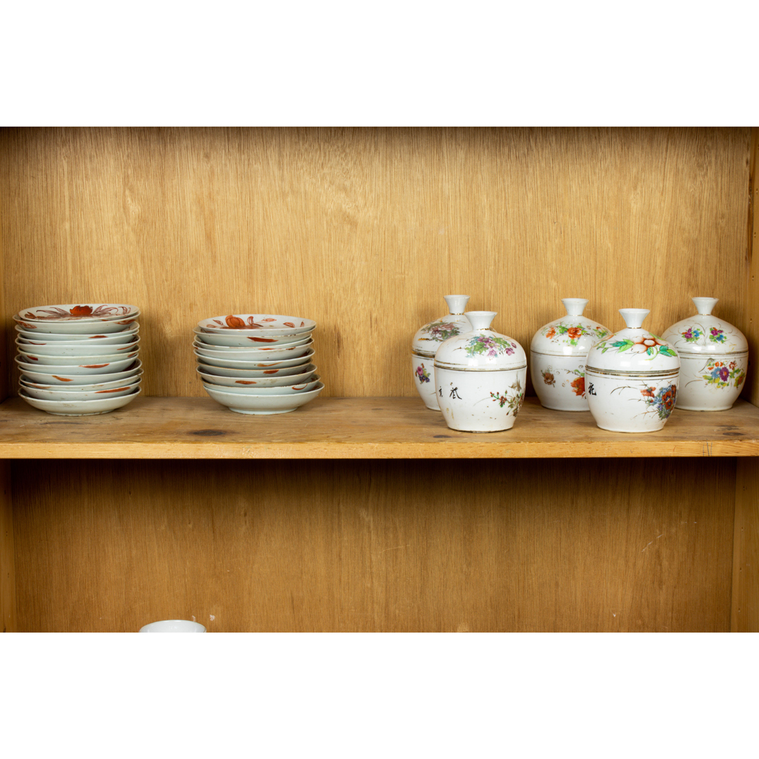 Appraisal: SHELF OF CHINESE FAMILLE ROSE AND IRON-RED DECORATED WARES Shelf