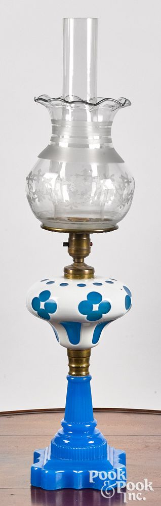 Appraisal: White cut to blue overlay glass fluid lamp White cut