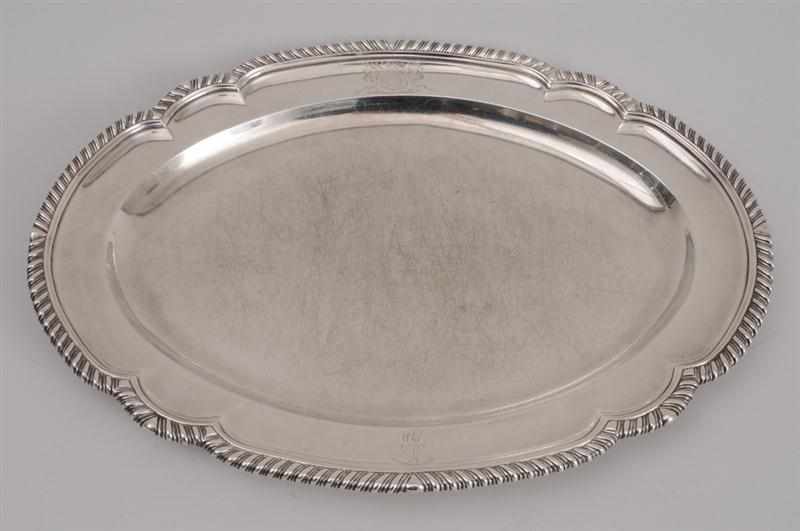 Appraisal: GEORGE III ARMORIAL SILVER MEAT DISH WE London with shaped