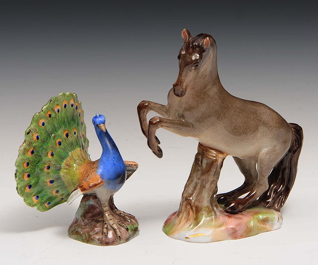 Appraisal: Two Meissen miniature models of a peacock and a horse