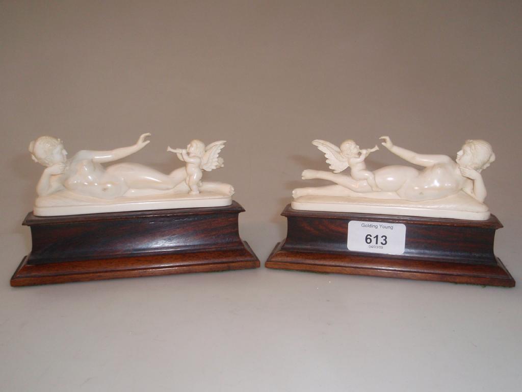 Appraisal: A pair of Ivory Art Academy figures of reclining female