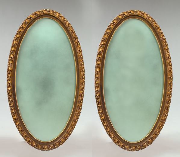 Appraisal: Pair of Rococo-Style Oval Giltwood Mirrors h w -