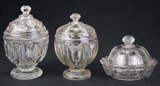 Appraisal: th c pattern molded covered sugar bowls covered butter dish