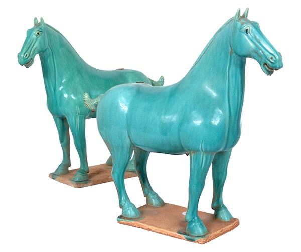 Appraisal: A PAIR OF HAN STYLE GREEN GLAZED EARTHENWARE HORSES cm