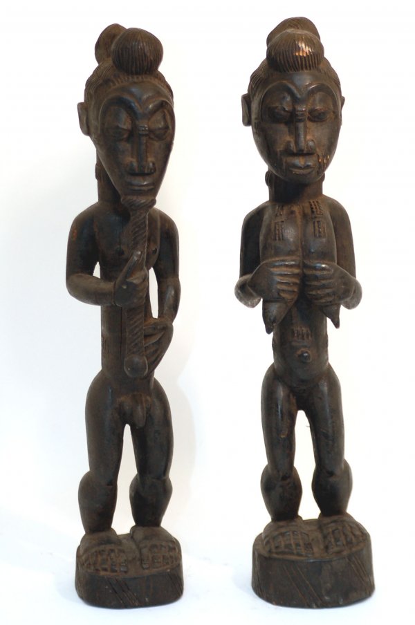 Appraisal: Baule Blolo Bla female and Blolo Bian male figures representing