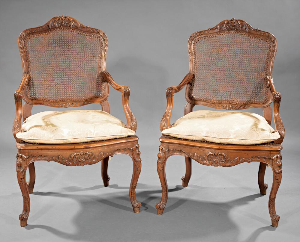 Appraisal: Pair of Louis XV-Style Carved Beechwood Fauteuils foliate-carved crest rail