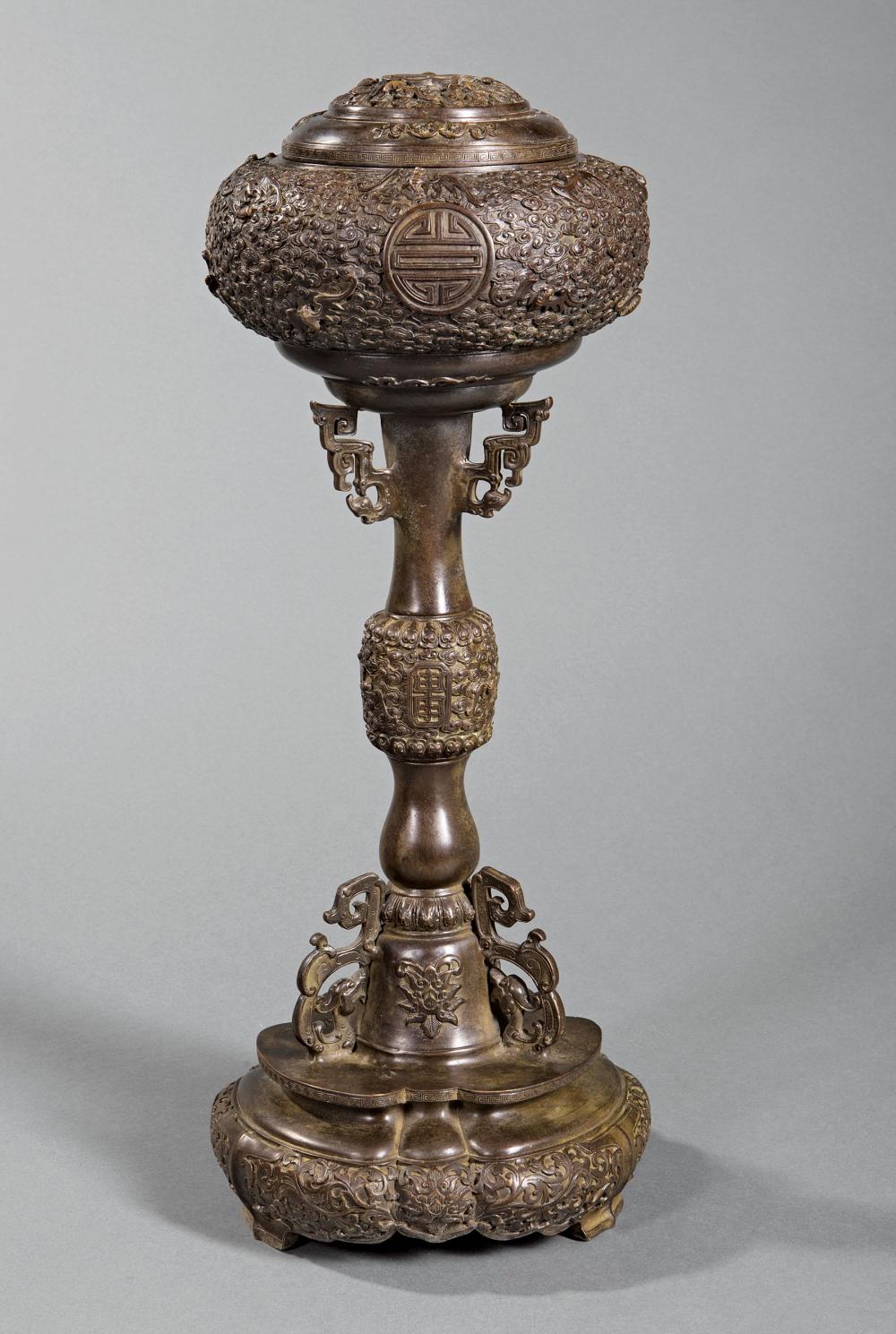 Appraisal: Chinese Patinated Bronze Covered Hat Stand pierced cover globular top