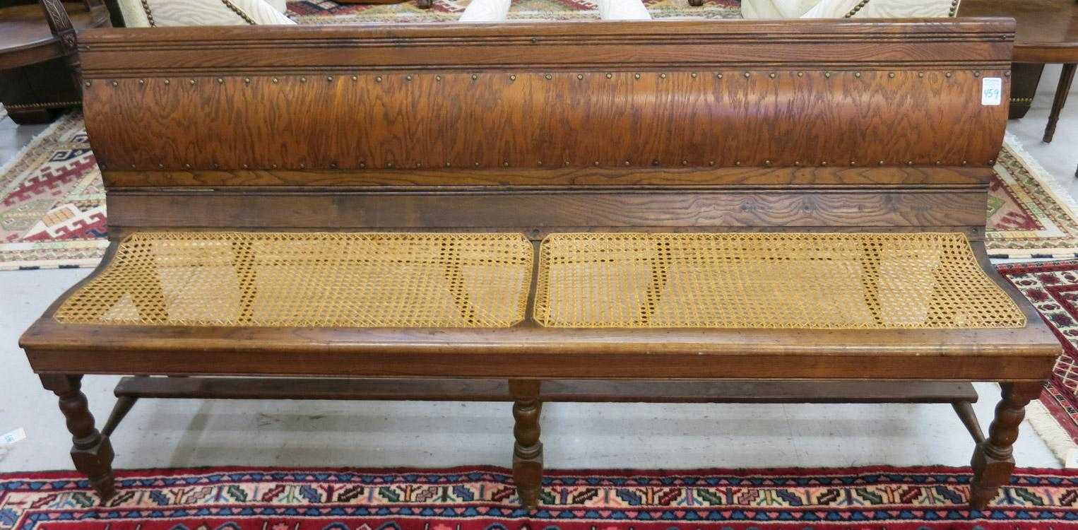 Appraisal: AN OAK TRAIN STATION BENCH American c an armless bench