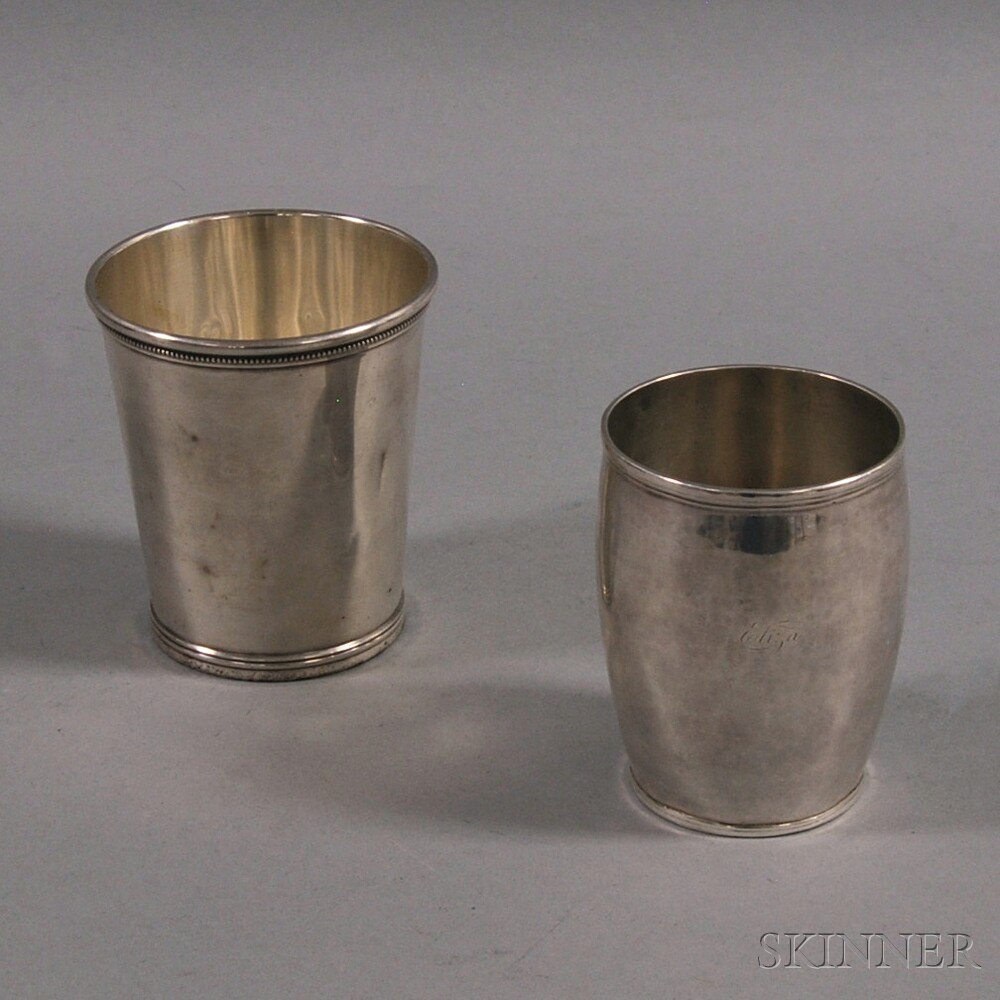 Appraisal: Two Sterling Silver Cups an Andrew Osthoff cup with rounded