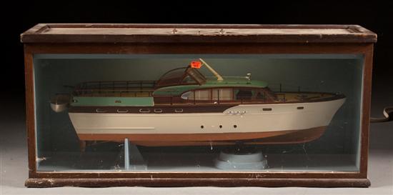 Appraisal: Assembled painted plastic model of a Chris-Craft pleasure boat in