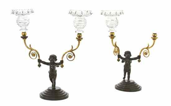 Appraisal: A Pair of Continental Gilt and Patinated Bronze Two-Light Figural