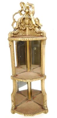 Appraisal: A Victorian giltwood and gesso hanging corner etagere the ribbon