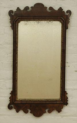 Appraisal: George II Walnut and Parcel-Gilt Mirror