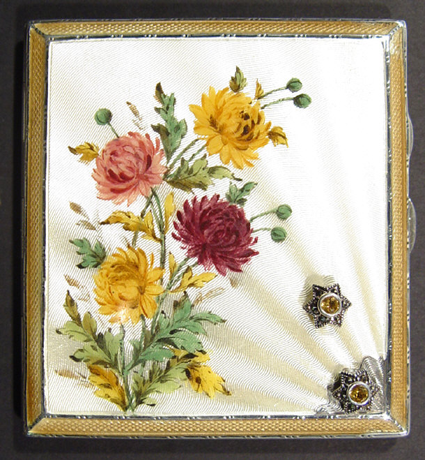 Appraisal: Rectangular silver cigarette case printed with colourful flowers onto an