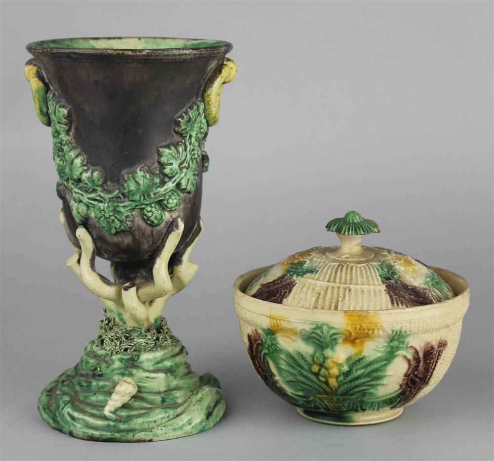 Appraisal: AUBERGINE MAJOLICA GOBLET AND A GREEN SPLASHED COVERED BOWL the