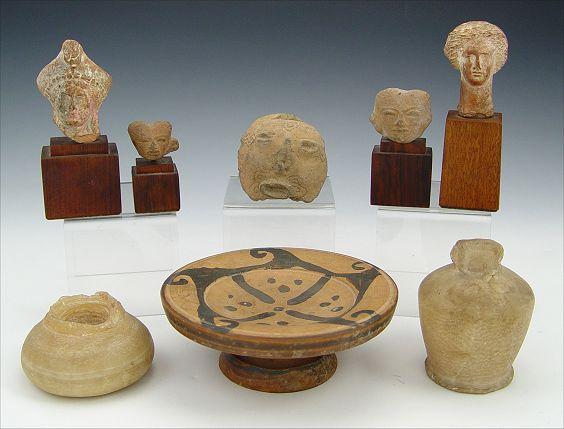 Appraisal: GROUP OF ANTIQUITIES HELLENISTIC HEADS POTTERY ETC To include Hellenistic