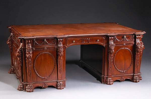 Appraisal: A George III style mahogany partners' desk and credenza The