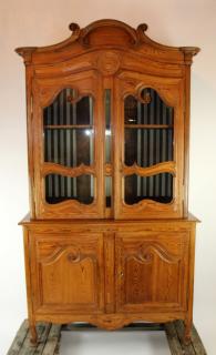 Appraisal: French Provincial buffet deux corps in pine French Provincial buffet