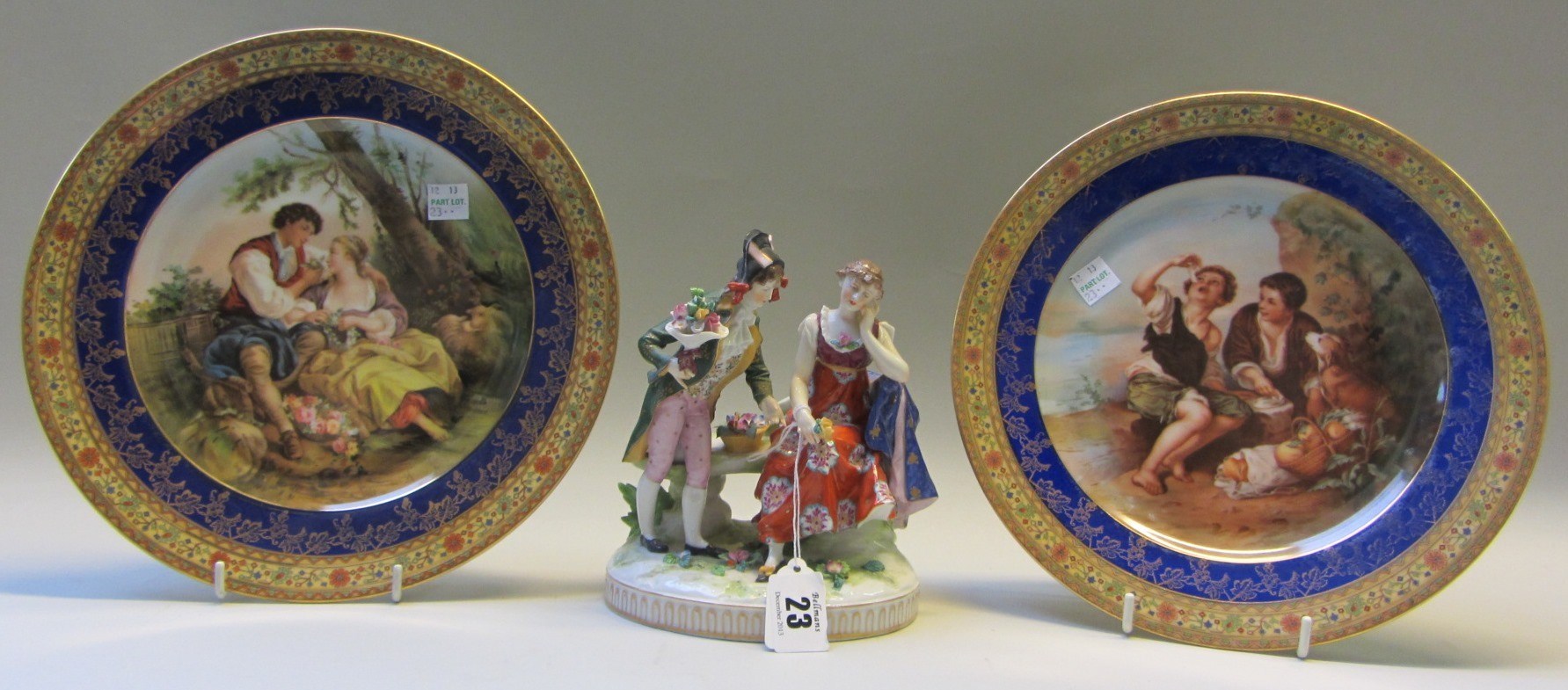 Appraisal: A German porcelain group of a gallant and companion th