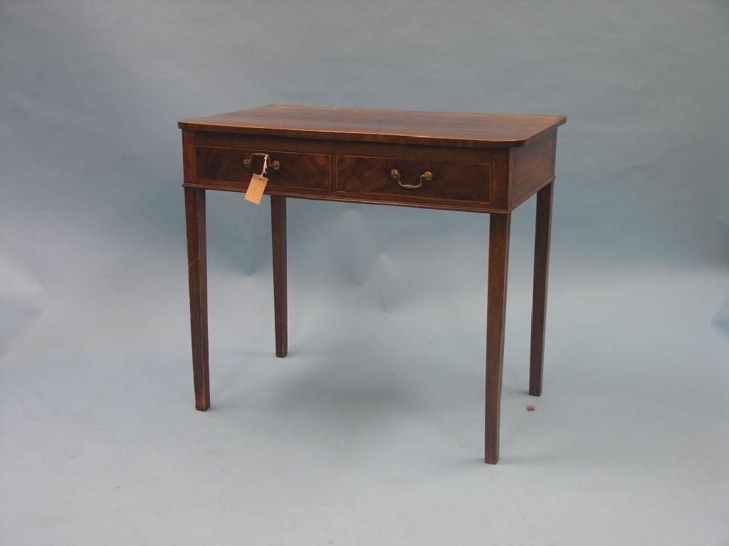 Appraisal: A George III mahogany side table with two frieze drawers