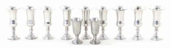 Appraisal: American sterling cordial set set of cut-decorated tulip form cups