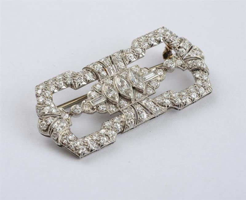 Appraisal: ART DECO PLATINUM AND DIAMOND BROOCH Set with round baguette