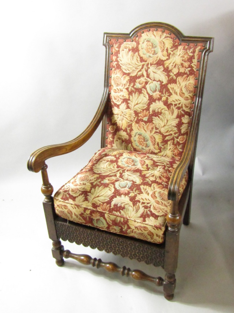 Appraisal: A Victorian oak carver chair with a studded floral upholstered