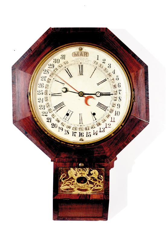 Appraisal: Gilbert Maranville Calendar wall clock circa rosewood-veneer drop octagonal case