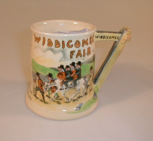 Appraisal: A Crown Devon Widdecombe Fair pottery musical mug circa 's