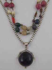 Appraisal: A mixed lot comprising a silver mounted amethyst pendant on