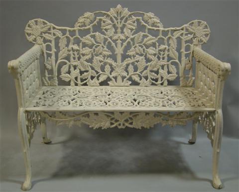 Appraisal: WHITE PAINTED CAST IRON GARDEN BENCH the shaped back with