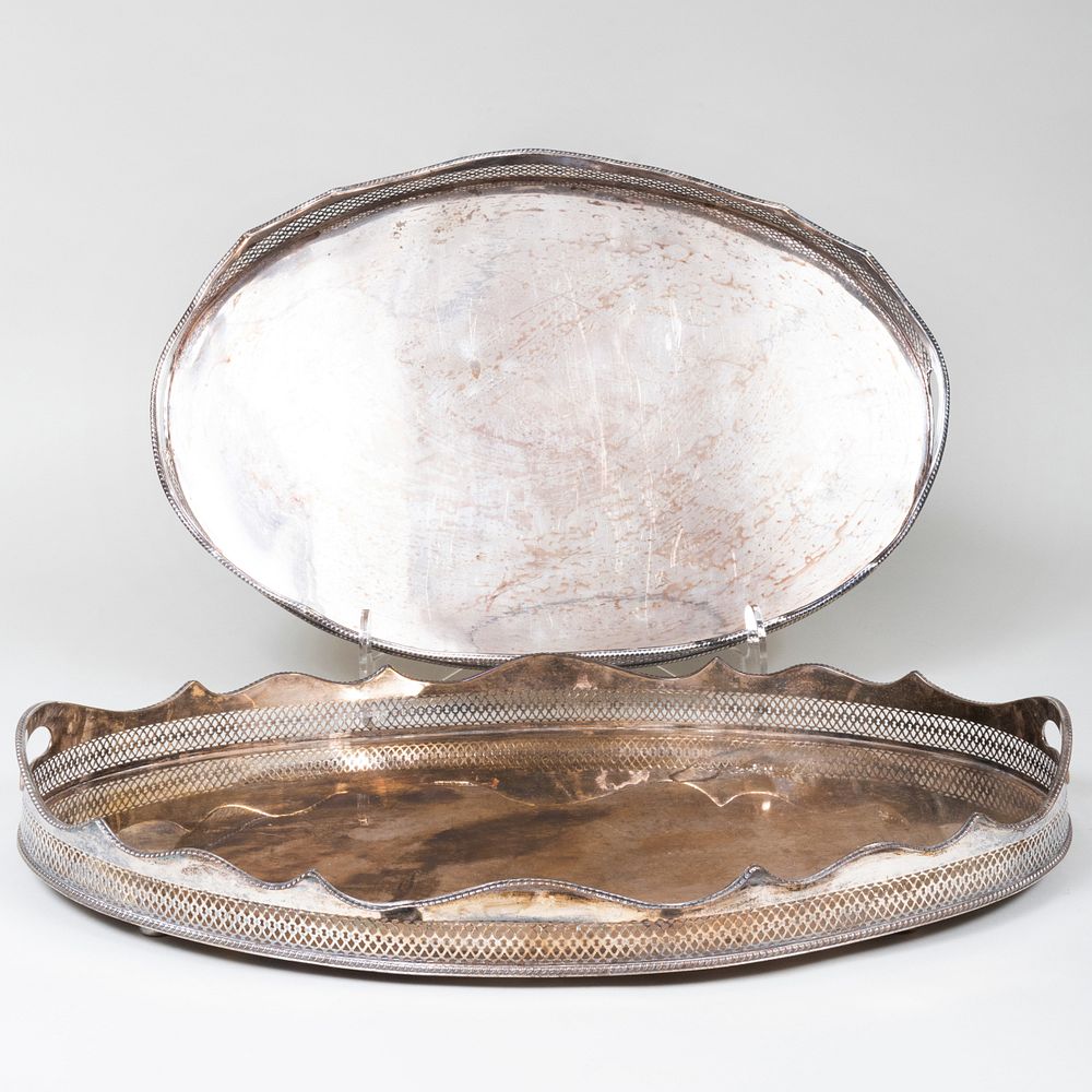 Appraisal: Two Oval Silver Plate Galleried Trays The larger x x