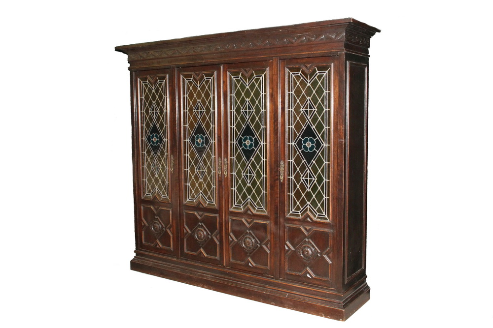 Appraisal: FORMAL OAK BOOKCASE WITH LEADED GLASS WINDOWS - Tudor Style