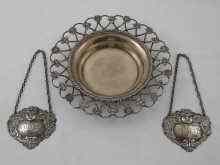 Appraisal: A silver wine coaster the rim with a wirework collar