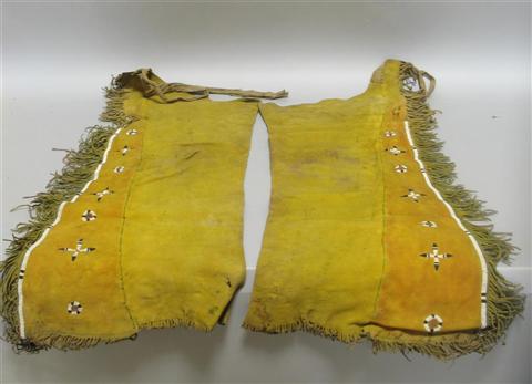 Appraisal: PAIR OF SIOUX BEADED HIDE LEGGINGS Of tanned hide with