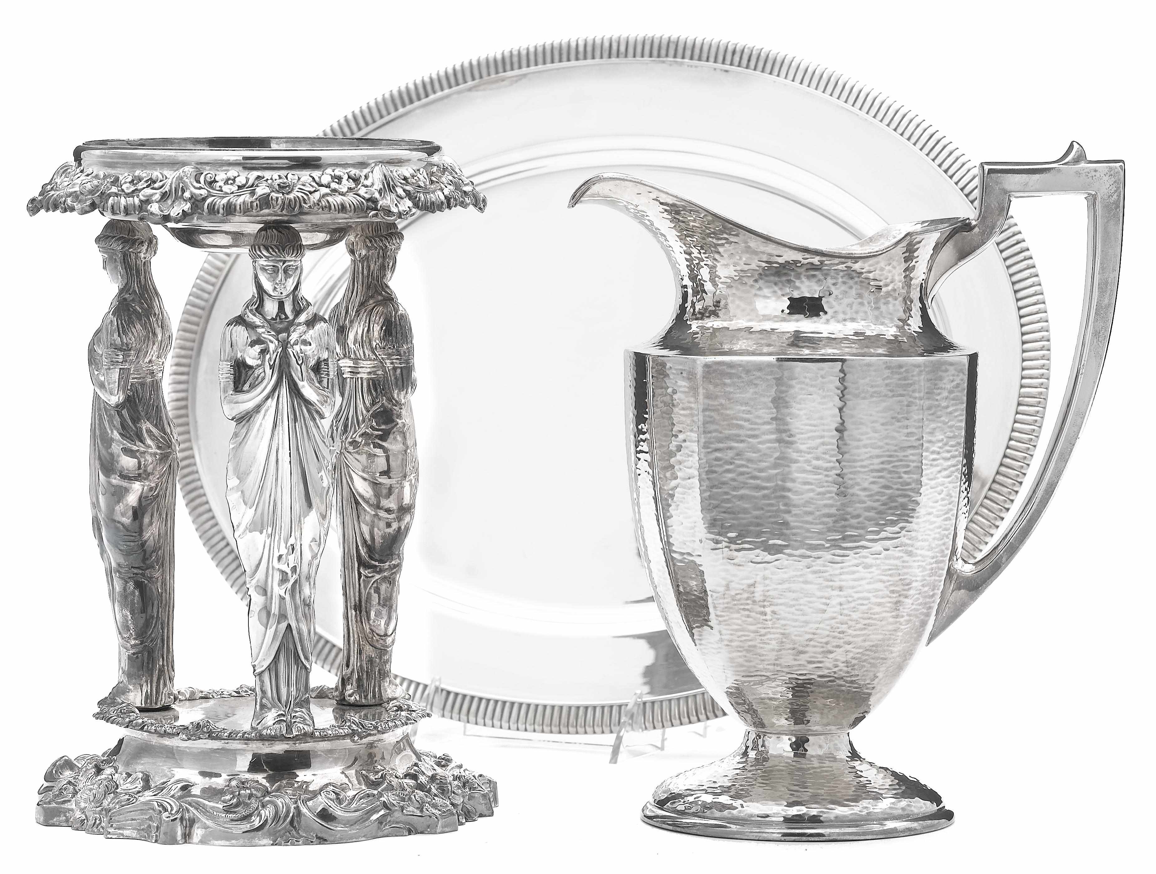 Appraisal: A plated group Including a figural stand a water pitcher