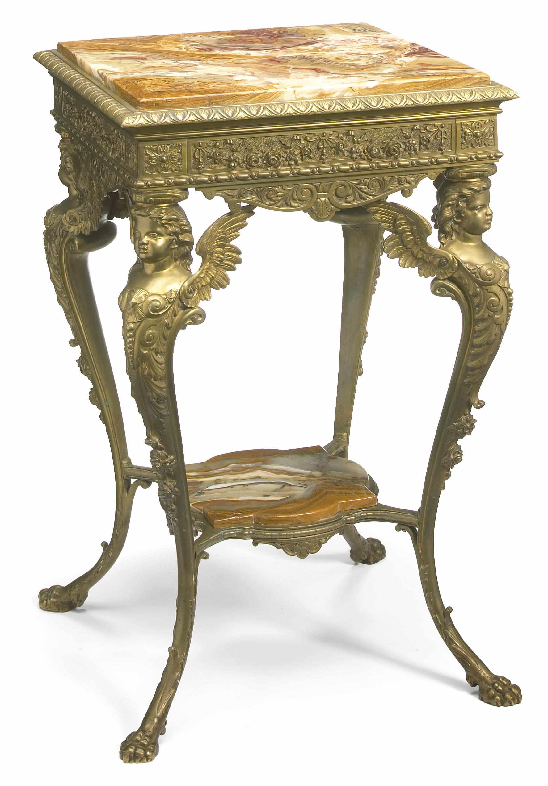 Appraisal: A French gilt bronze onyx two tiered occasional table early