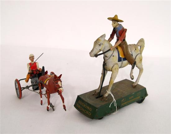 Appraisal: Two early s tin toys a litographed Lehmann ''Wild West''