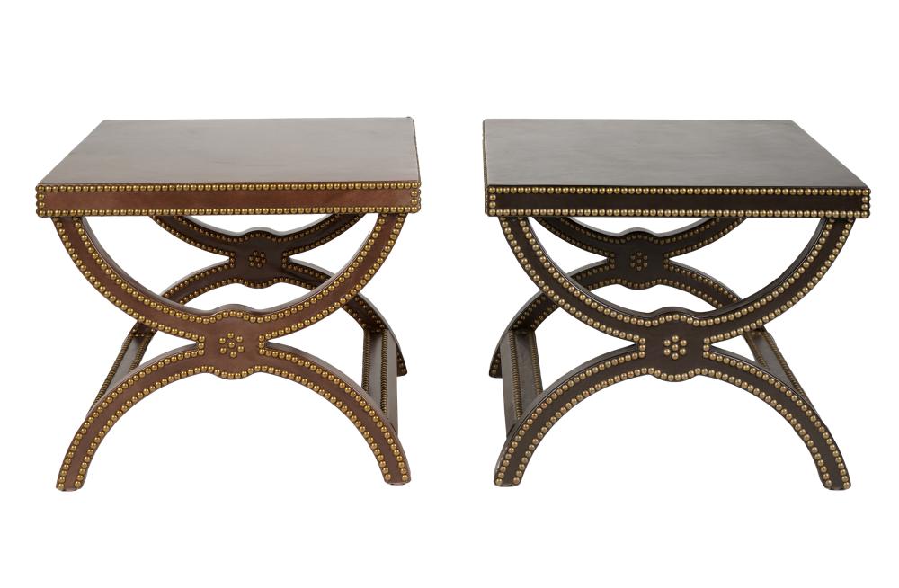 Appraisal: PAIR OF LEATHER-WRAPPED CURULE BENCHESunsigned trimmed with brass nail heads