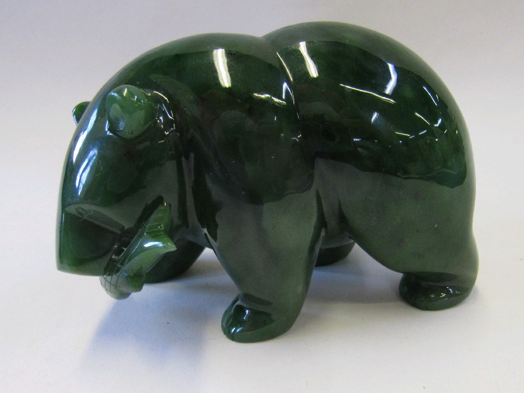 Appraisal: Carved jade figure of a bear with a fish in