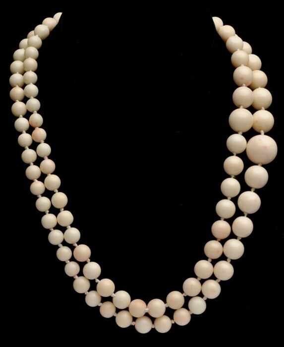 Appraisal: WHITE CORAL BEAD NECKLACE WITH CAMEO CLASP Clasp stamped k